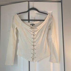 Woman’s Express cream corset top. Size medium.